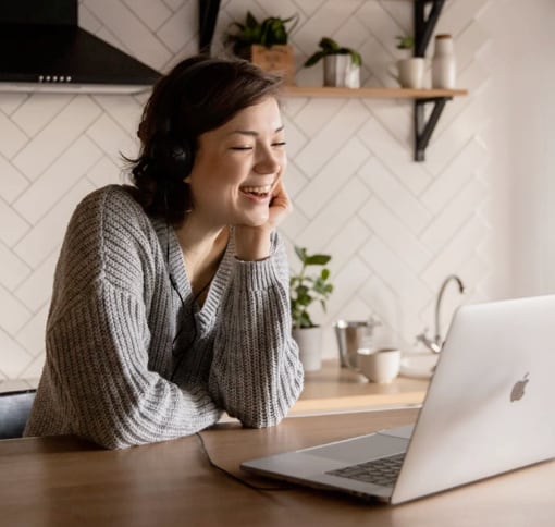 portrait of woman making a videocall with a laptop